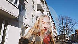 Authentic urban street portrait of young woman