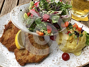 Authentic Wiener Schnitzel vom Schwein & x28;Pork Schnitzel& x29; Served in Germany photo