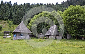 Authentic wooden houses in the traditional Carpathian style at old village Kolochava