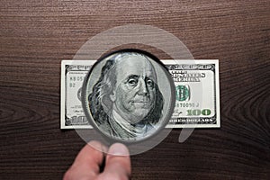 One hundred dollars banknote authentication photo