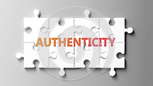 Authenticity complex like a puzzle - pictured as word authenticity on a puzzle pieces photo