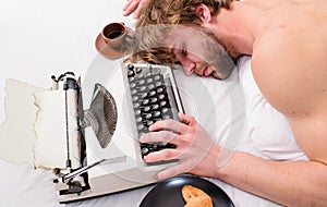Author tousled hair fall asleep while write book. Workaholic fall asleep. Man with typewriter sleep. Exhausting