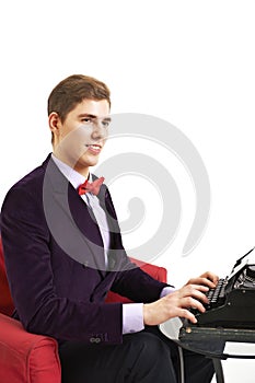 Author typing on a typewriter
