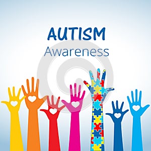 Autism awareness concept with hand of puzzle pieces