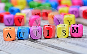 Autism word on table