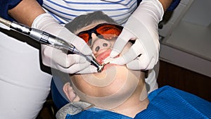 Autistic boy in dental treatment. brace. health care