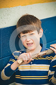 Autistic Boy with Stick