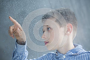 Autistic child counting raindrops