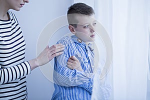 Autistic child with hypersensitivity photo