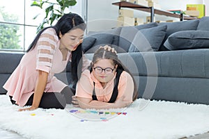 Autistic girl practicing learning development at home