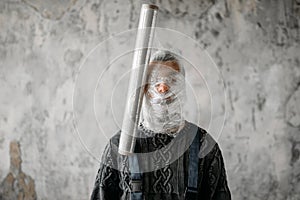 Autistic wraps his face with packaging film