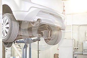 The auto car in srvice to fix and repair some problems, bottom of the vehicle