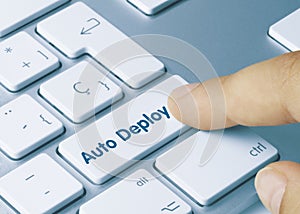 Auto deploy - Inscription on Blue Keyboard Key photo