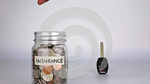 Auto insurance money jar concept