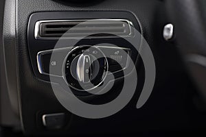 Modern car headlight controls.