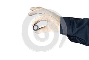 An auto mechanic holds in his hand a faulty timing belt idler on a white background, isolate. Close-up, inspection
