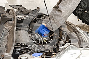 Auto Mechanic& x27;s Hands. Repair of a car with a diesel engine. Auto Mechanic& x27;s Hands