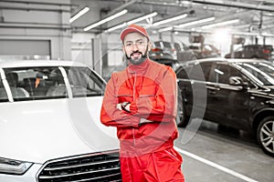 Auto mechanic`s portrait at the car service