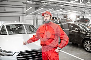 Auto mechanic`s portrait at the car service