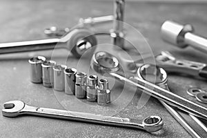 Auto mechanic`s tools on table
