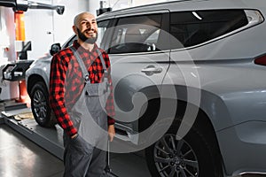 Auto mechanic working at auto repair shop