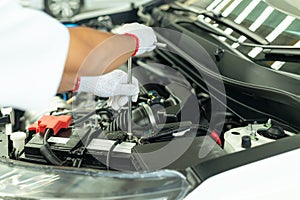 Auto mechanic working in garage, Car Repair Service center.