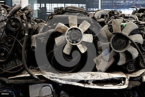 Auto parts and secondhand engine components in auto spare parts store. Spare parts of vehicle in warehouse