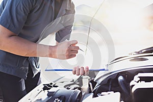 Auto repair specialist has checked the engine repair list for both internal and external systems