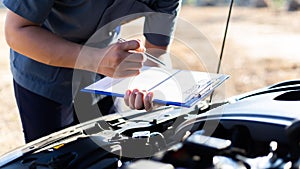 Auto repair specialist has checked the engine repair list for both internal and external systems