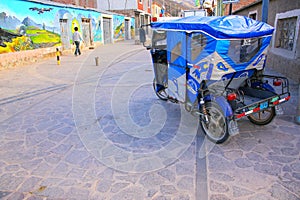 Auto rickshaw parked in the street of Chivay town, Peru