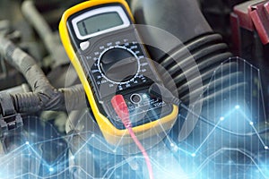 Multimeter or voltmeter testing car battery