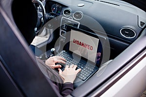 Auto thief trying to break car security systems