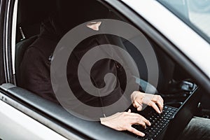 Auto thief trying to break car security systems