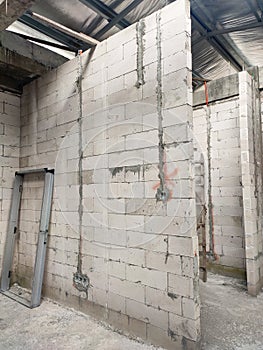 Autoclaved aerated concrete block or known as AAC block used at the construction site.