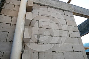 Autoclaved aerated concrete block or known as AAC block used at the construction site.