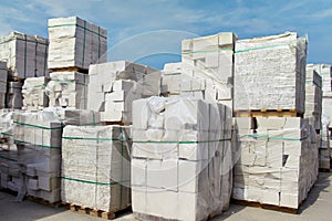 Autoclaved aerated concrete blocks on pallets stored at warehouse