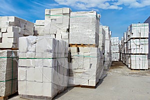 Autoclaved aerated concrete blocks on pallets stored at warehouse