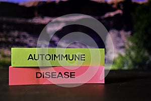 Autoimmune Disease on the sticky notes with bokeh background photo