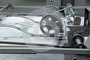 Automated conveyor belt for processing polypropylene bags.