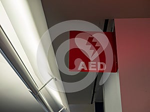 Automated external defibrillator AED logo hanging in public area