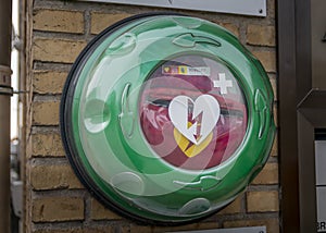 Automated External Defibrillator AED Philips on the street in the city of Randers, Denmark. AED CPR Rescue Kits box. Medical