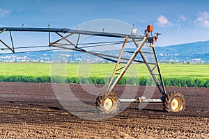 Automated Farming Irrigation Sprinklers System in Operation