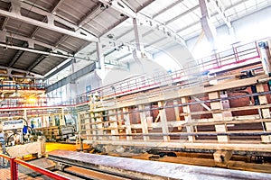 automated industrial equipment at the factory in production hall