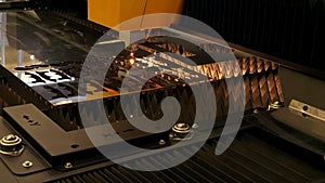 Automated industrial laser cutting steel in the factory.