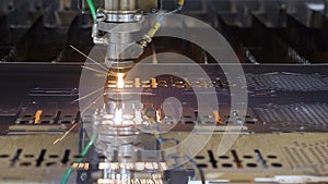 Automated machine CNC laser cutting metal plate. Modern machine laser metal sheet cnc cutting steel plate. High