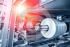 Automated machine tool in factory, part of conveyor belt close up as abstract industrial background