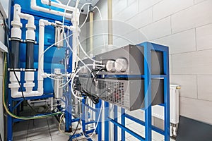 Automated ozone generator for ozonation of pure drinking water in water production factory, close up