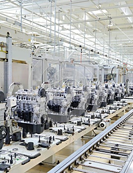 Automated production line with new engines in car factory