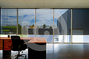 Automated roller blinds in modern office