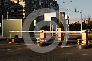 Automatic barrier gates for supermarket parking lot. Security system for car park entry to shopping mall. Vehicle